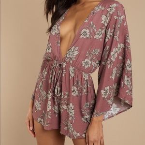 Size small romper. New w/tags